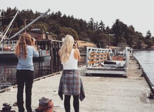 Hannah (left) and Laurel (right) observing and photographing a few members of the FHL Belted Kingfisher family.