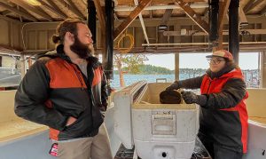 Mitch McCloskey and Sage Enright of the San Juan Islands Conservation District process captured eelgrass flowers.