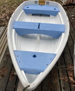 White Rowboat with blue seats